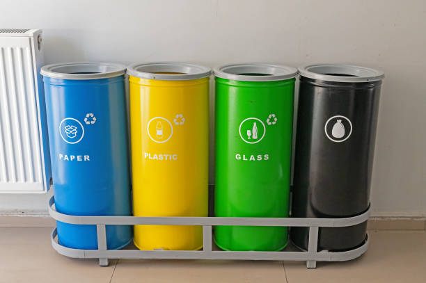 paper, plastic and glass recycling bins