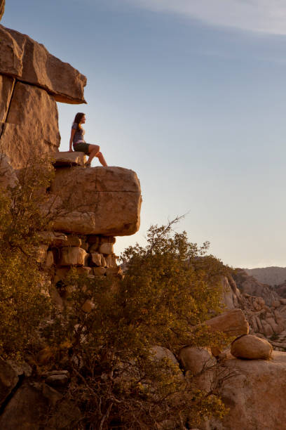 istock Woman hiker sitting on a rock 168508162