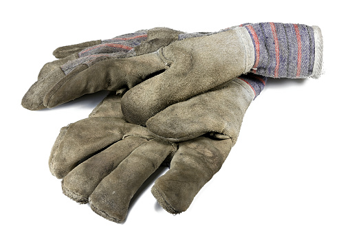 used work gloves isolated on white background