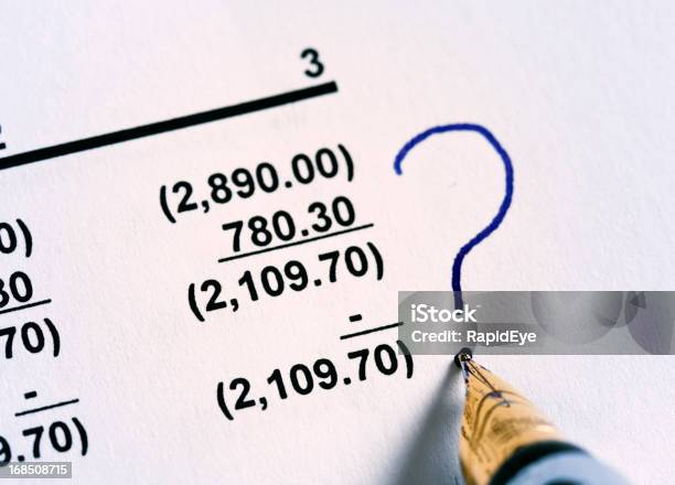 Fountain Pen Puts Question Mark By Column Of Numbers Problems Stock Photo - Download Image Now