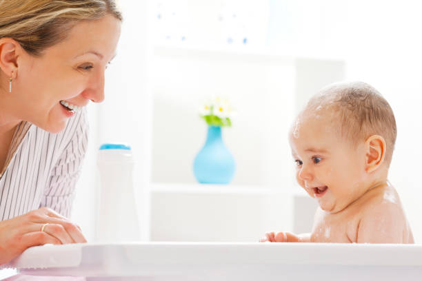 istock Mother and Daughter Having Fun in Baby Bath 168509958