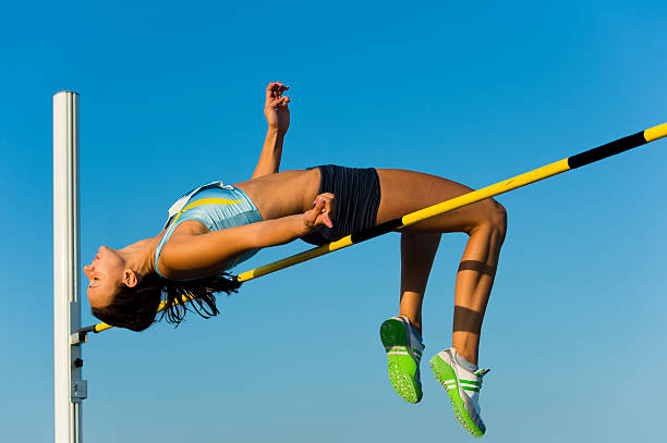istock Attractive young woman at high jump 168511058