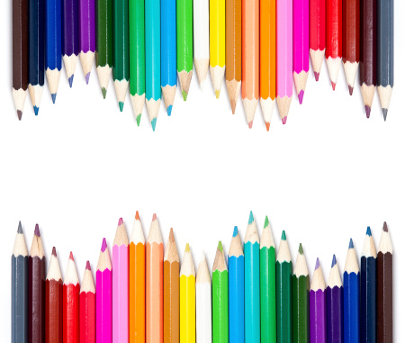 Rainbow colored wooden pencils with faces have many emotions