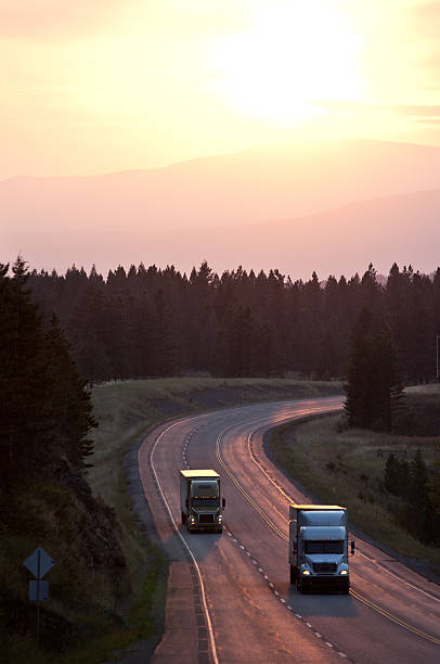 istock Semi-Trucks on the Highway at Sunset 168511693