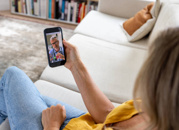 istock Doctor talking to a patient on a video call 1685139713