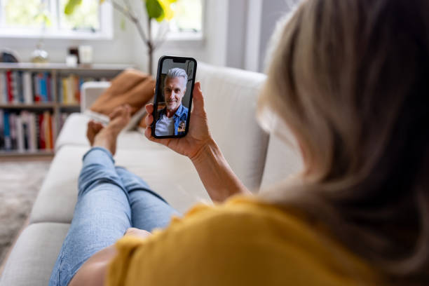 istock Woman at home making a video call with her husband using her cell phone 1685139717