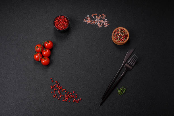 istock Ingredients for cooking cherry tomatoes, salt, spices and herbs 1685144956