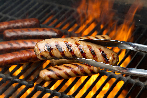 grilling brats - sausage imagens e fotografias de stock