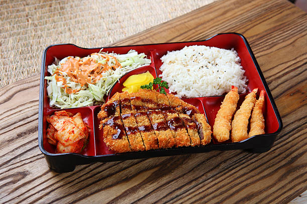 Cutlet Lunch Box Japanese or Korean style Combination Bento (Lunch box) with Cutlet, Steamed Rice, Tempura & Salad banchan stock pictures, royalty-free photos & images