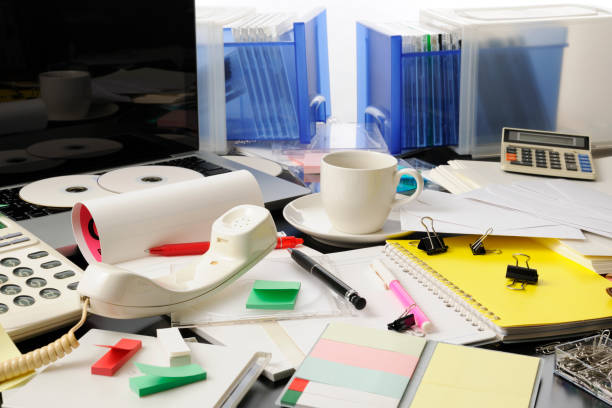 Desktop in a mess intensely Desktop in a mess intensely. paper clip office supply stack heap stock pictures, royalty-free photos & images