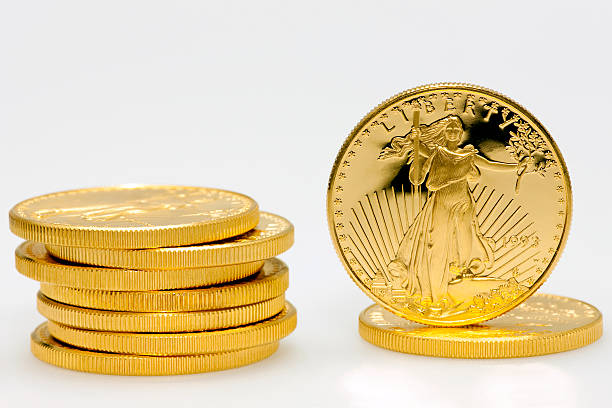 istock American Gold Dollar Coins Stacked 168521982