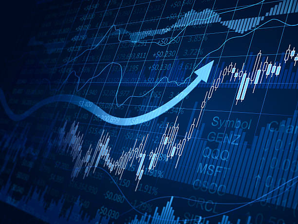 A blue financial chart with arrows pointing up stock photo