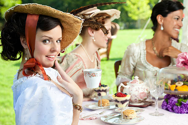 frau mit hand auf gesicht im viktorianischen tea party - old fashioned tea cup victorian style beauty stock-fotos und bilder