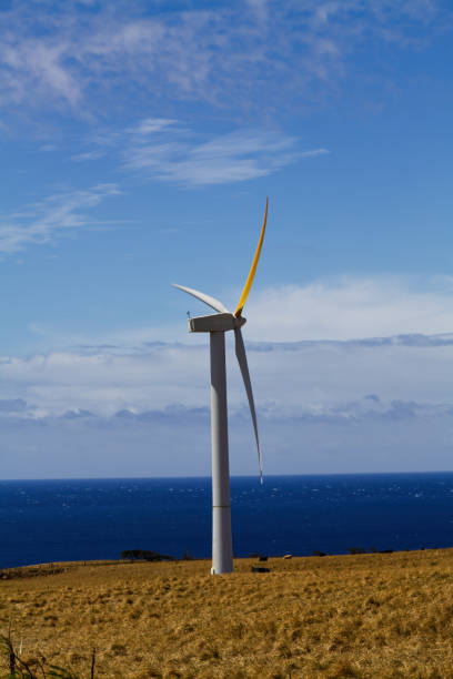 istock Single Wind Mill Tower Standing On Hill Hawaii Big Island 1685228120