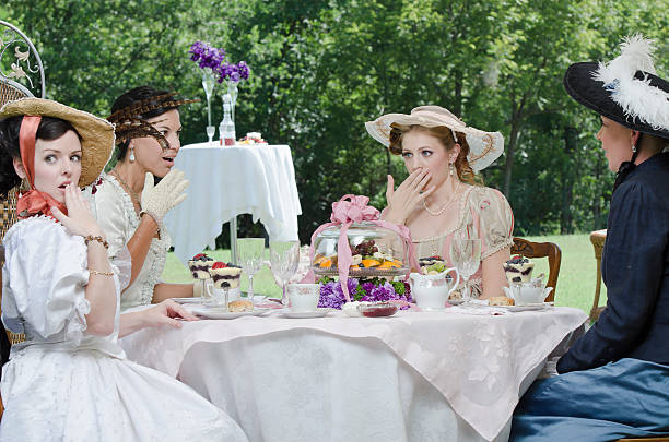 istock Four girls gossiping 168523291