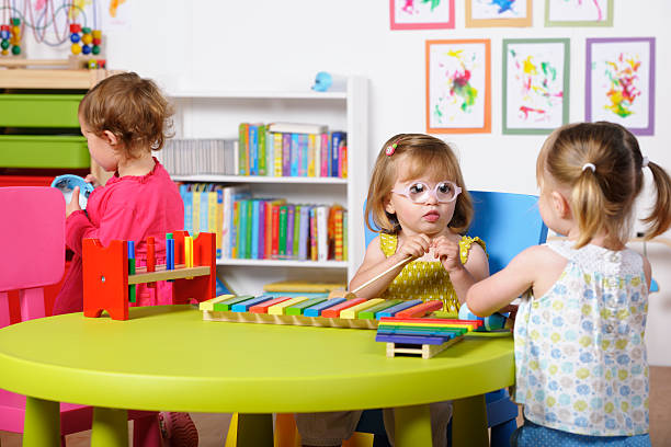 istock Toddlers Enjoying Music/ Playtime At Nursery 168523308