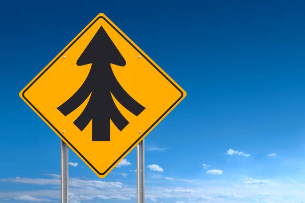 An informational traffic sign over a blue sky showing that all roads lead to one - with precise clipping path around sign. File composed of individual Canon5D MarkII photographs and composed in Photoshop.