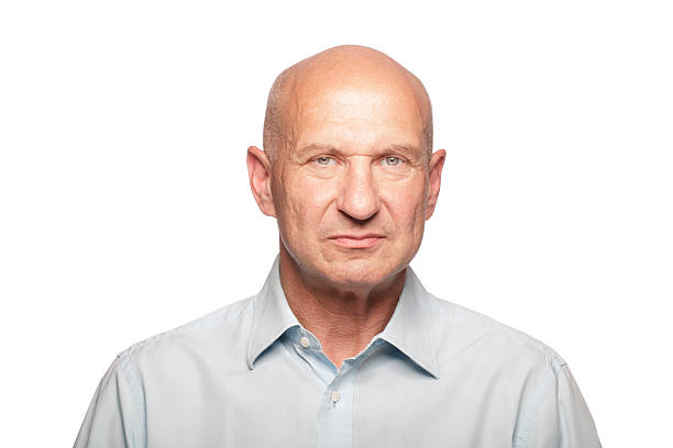Portrait of a man http://bit.ly/1bpNamm completely bald stock pictures, royalty-free photos & images