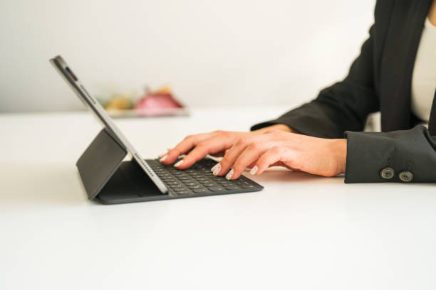 istock businesswoman writing on tablet close-up 1685272372