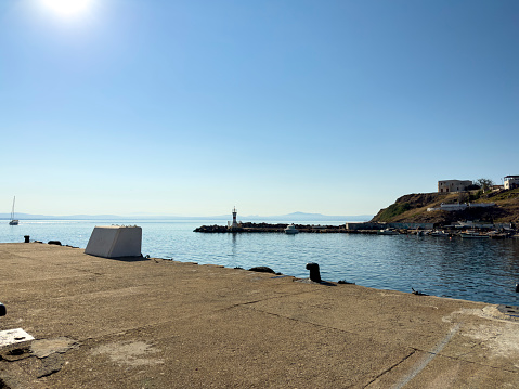 Bozcaada harbor on a sunny summer morning. Turkish island in the North Aegean Sea. No people.