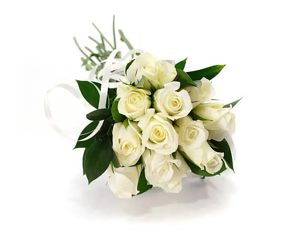 Photo of White rose flower bouquet or wedding posy on isolated background