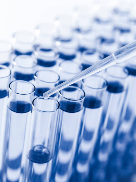 istock Droplet Falling from Pipette into Test Tube. 1685282733