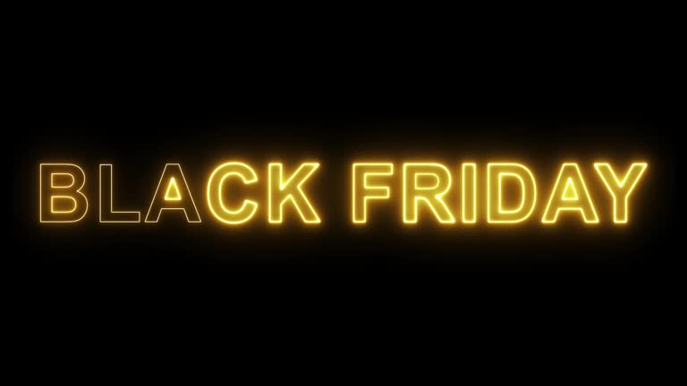 Black friday written with neon bright glowing and fire effect on black background. Animated Black Friday text on neon sign banner. Neon pink glowing sign. Sales promotional concept.