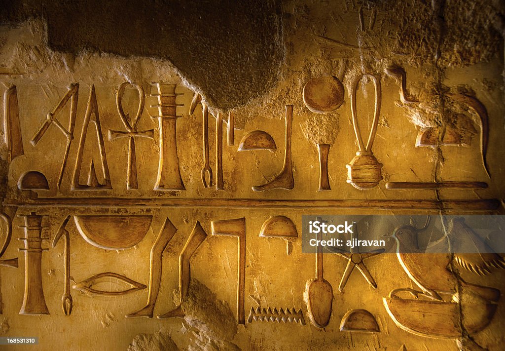 Two rows of Egyptian Hieroglyphics Hieroglyphs within a tomb in the Valley of the Kings. Egypt Stock Photo