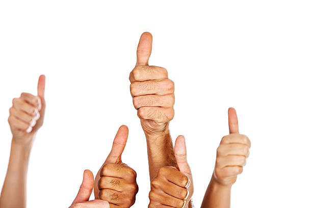 istock Many multiracial hands give thumbs up sign of approval 168533682