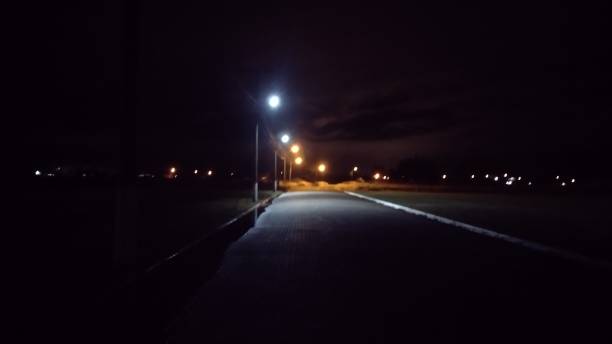 istock Night road photography on the beach 1685345280