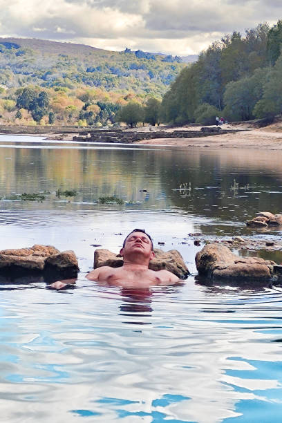 istock A man relaxing in thermal water 1685392700