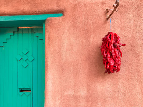 istock Santa Fe, NM: Red Chili Ristra, Adobe Wall, Green Door 1685470120