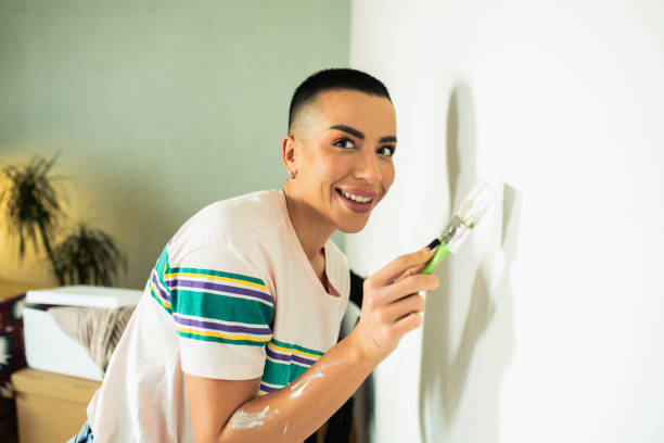 istock Young woman renovates her apartment 1685506873