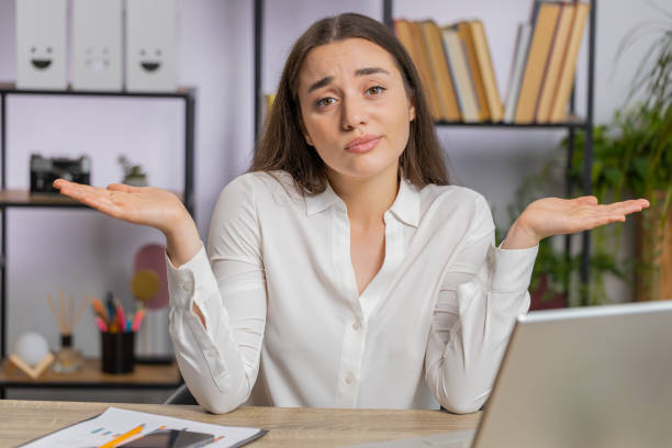 istock Confused businesswoman embarrassed about ambiguous question, having doubts, no answer idea, clueless 1685507437