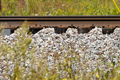 Railroad tracks wander through the country side and towns.