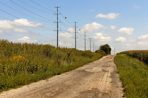 Road of gravel, dirt and an occasional patch of asphalt wanders through the countryside.