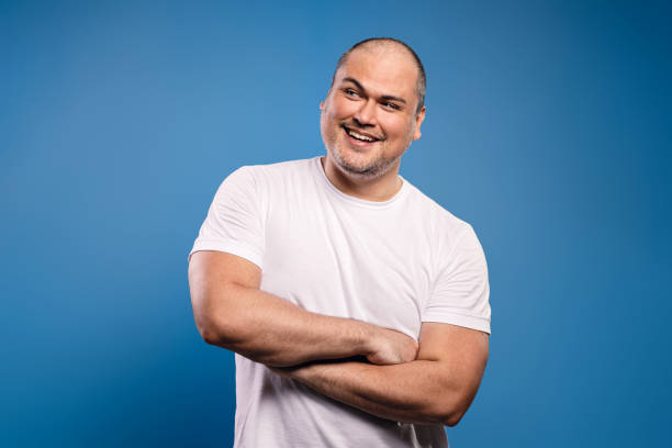 istock man with arms crossed looking to the side 1685530902
