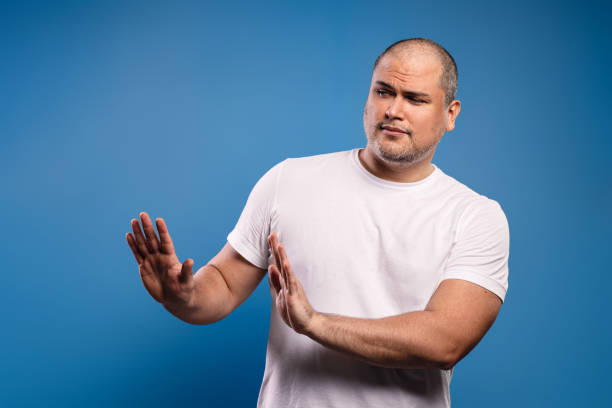 istock man with hands outstretched, as if asking to leave 1685530984