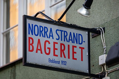 Stockholm, Sweden Aug 29, 2023 An old sign advertising the Norra Strand Bakery from 1932.