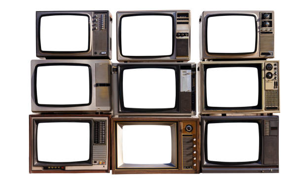 istock Pile of vintage televisions with cut out screen with clipping path isolated on white background. 1685679059