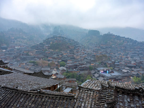 Miao village in the mountains, Guizhou, China Panoramic view of Miao village, Xijiang Qianhu Miao village, Guizhou, China. qiandongnan miao and dong autonomous prefecture stock pictures, royalty-free photos & images