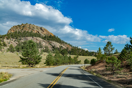 Highway through majestic rock formations in central Colorado in western USA of North America. Nearby cities are Denver and Colorado Springs, Colorado.