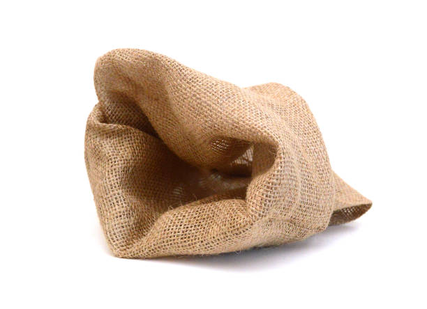 Hessian sack with ties forming over white background.