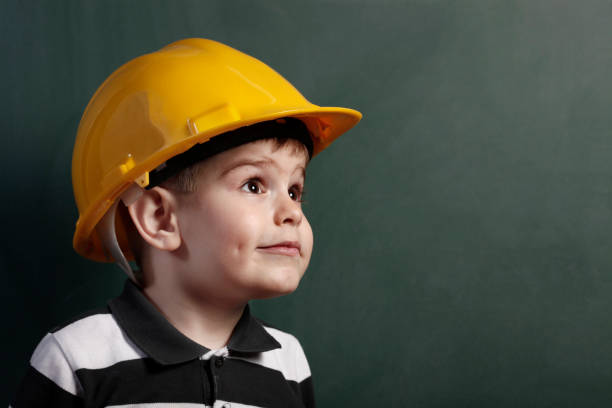 Boy in a hard hat.