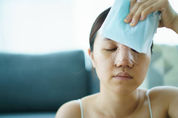 istock Woman face after nose plastic surgery. 1685810213