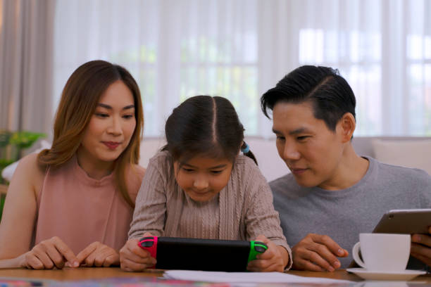 istock Couple with daughter make leisure activity together. 1685810246