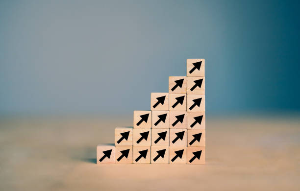 istock Woods block square step with green arrow growing, Statistics chart graph. Success startup business concept. Data management system statistics and analytics. KPI report and Planning strategy. 1685811928