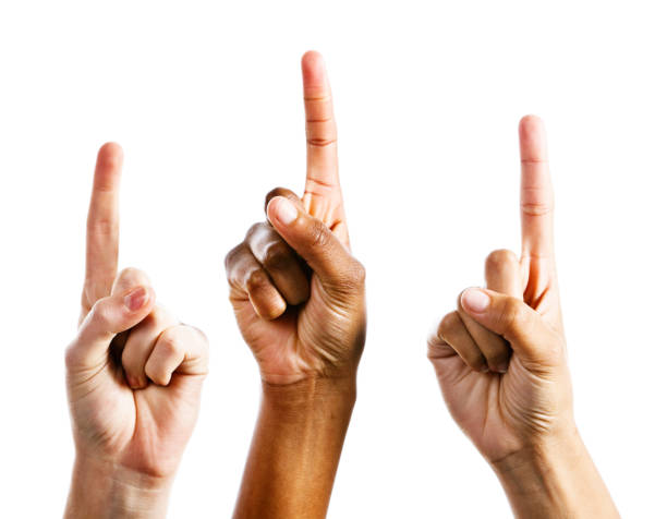 istock Three female hands point upwards, isolated on white 168582586