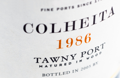 Label of a bottle of 1986 tawny port. The label has an almost wall paper-like structure. Tawny ports are typically bottled after several years on the barrel.