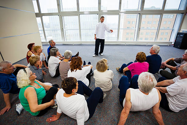 istock Seniors Watching Tai Chi Exercises 168588384